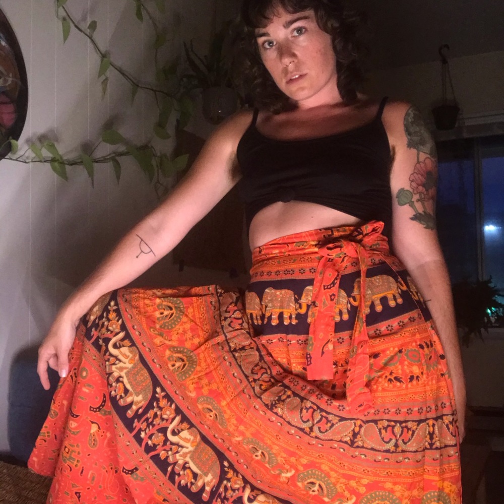 Bright orange ornate elephant wrap skirt